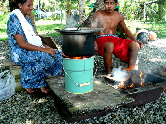 Already Cooking on Rocket Stove While Still Starting A Traditional